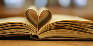 Book pages folded to form a heart