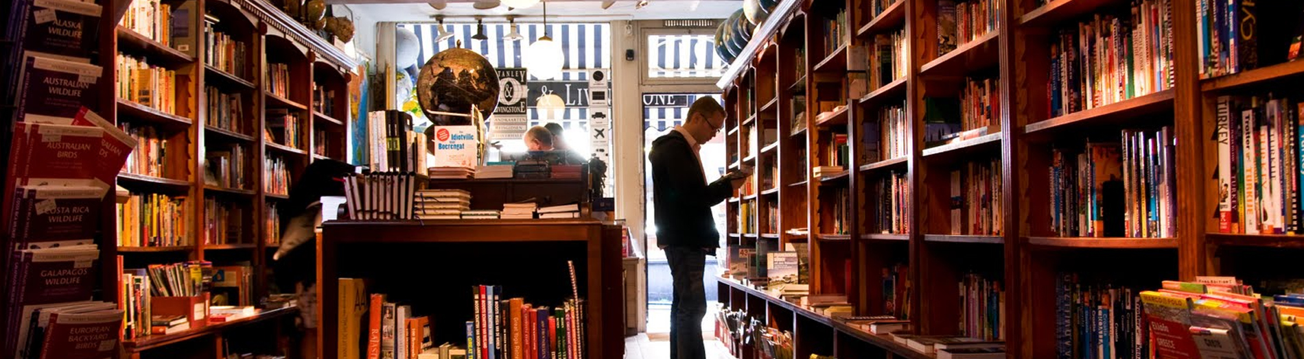 Picture of a man browsing at the book shoppe